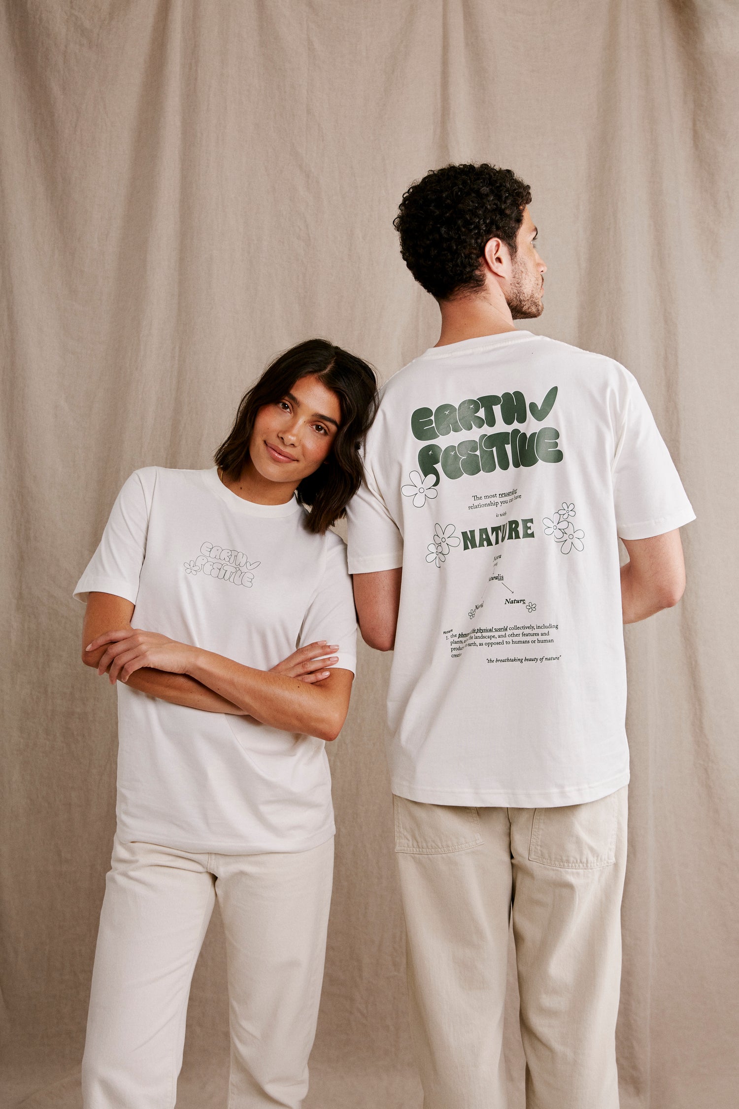 Models wearing Earth Positive Sustainable T-Shirts branded Earth Positive